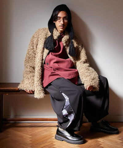 Knitted Beanie with Tassel