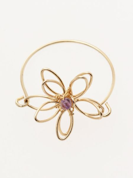 Anillo de flores de metal con piedras preciosas