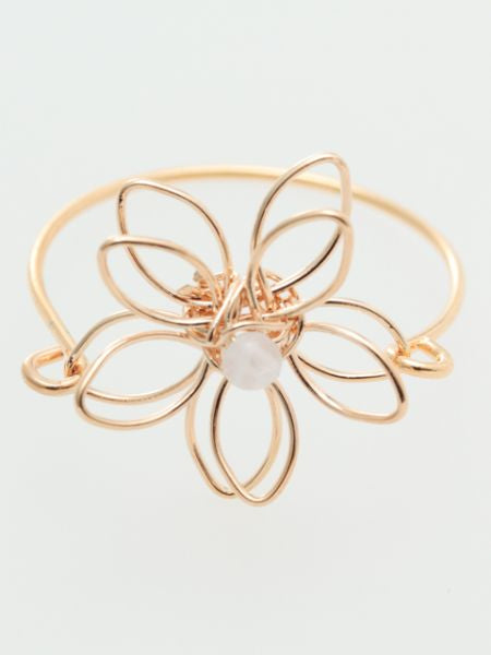 Anillo de flores de metal con piedras preciosas